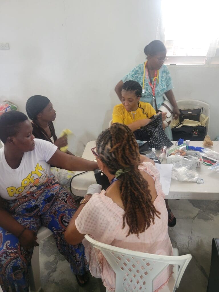 A group of people sitting around a table.